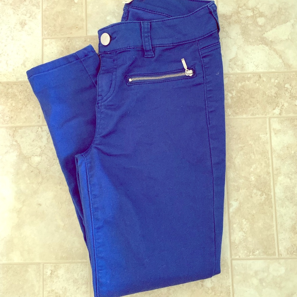 Juniors size 3 electric blue front zipper.